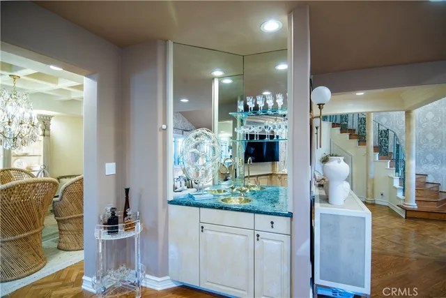 a kitchen with a table and chairs in it
