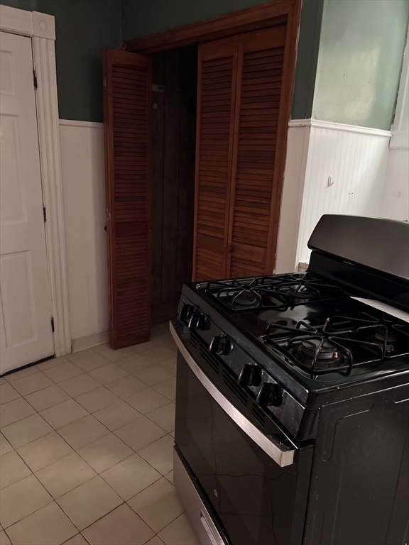 1 Congress Street, Unit 1 Worcester, MA 01609 - Photo 14 of 15 a stove top oven sitting inside of a kitchen