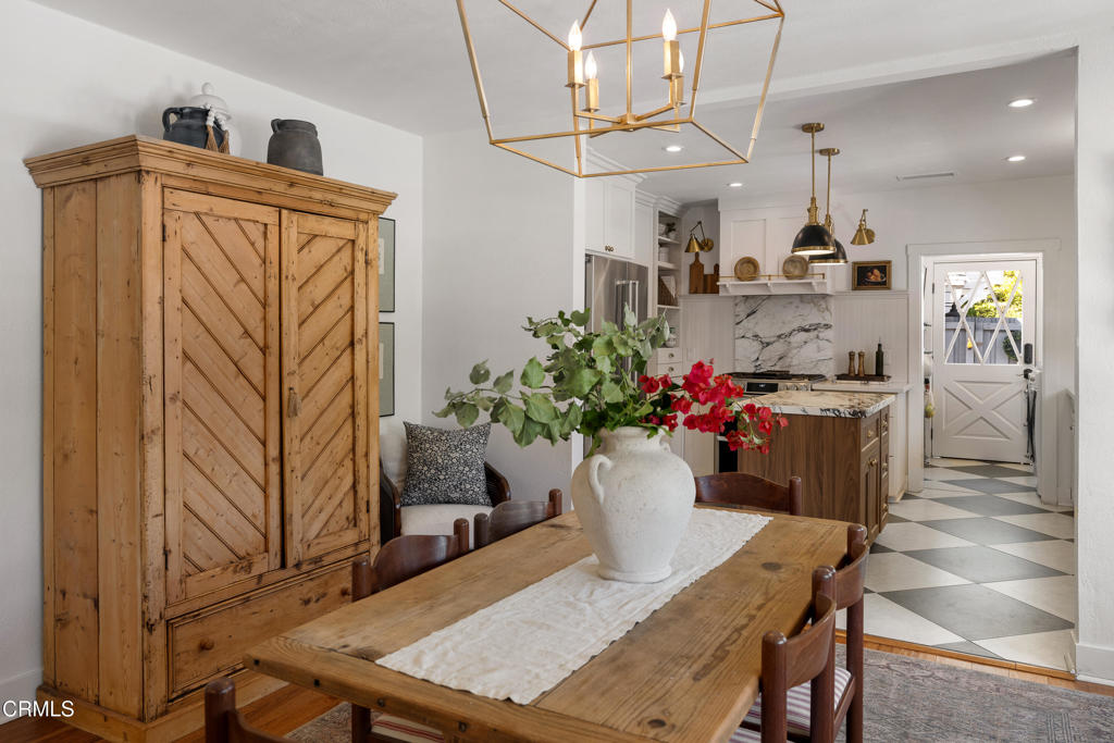 640 East Rio Grande Street Pasadena, CA 91104 - Photo 14 of 61 a view of a dining room with furniture and wooden floor