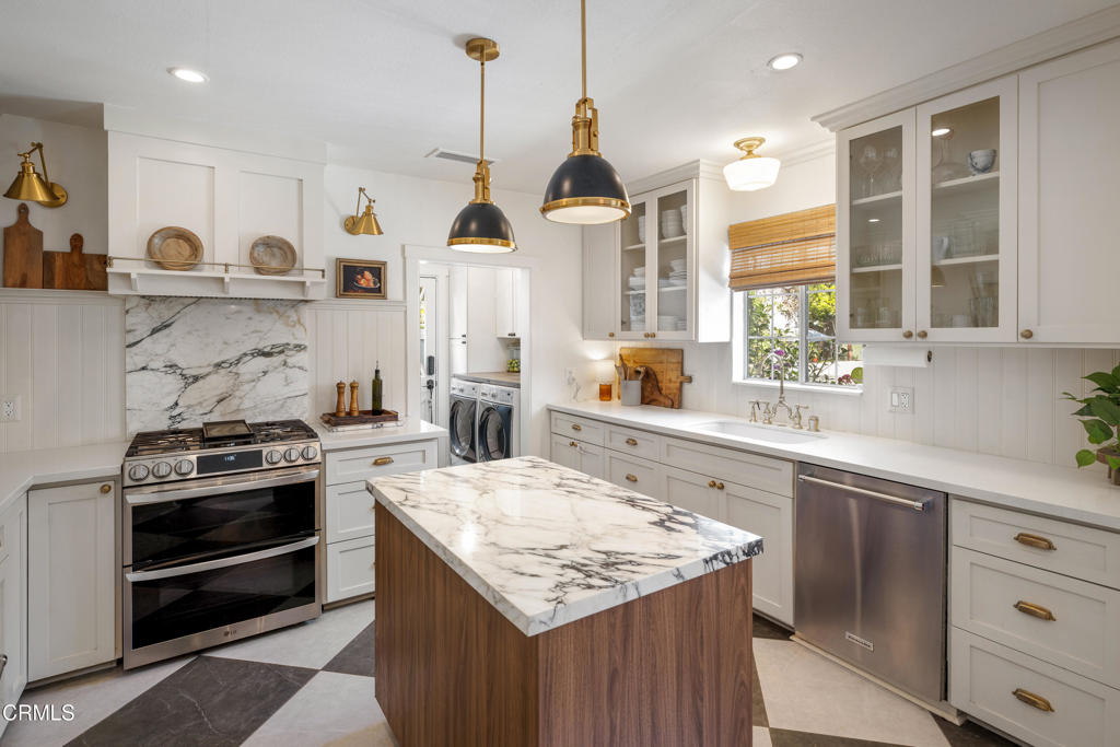 640 East Rio Grande Street Pasadena, CA 91104 - Photo 16 of 61 a kitchen with a stove and a sink
