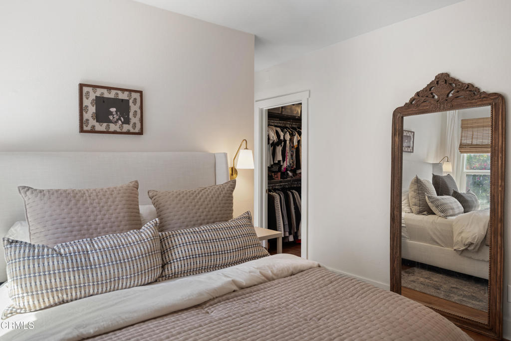 640 East Rio Grande Street Pasadena, CA 91104 - Photo 25 of 61 a bedroom with furniture and a walk in closet