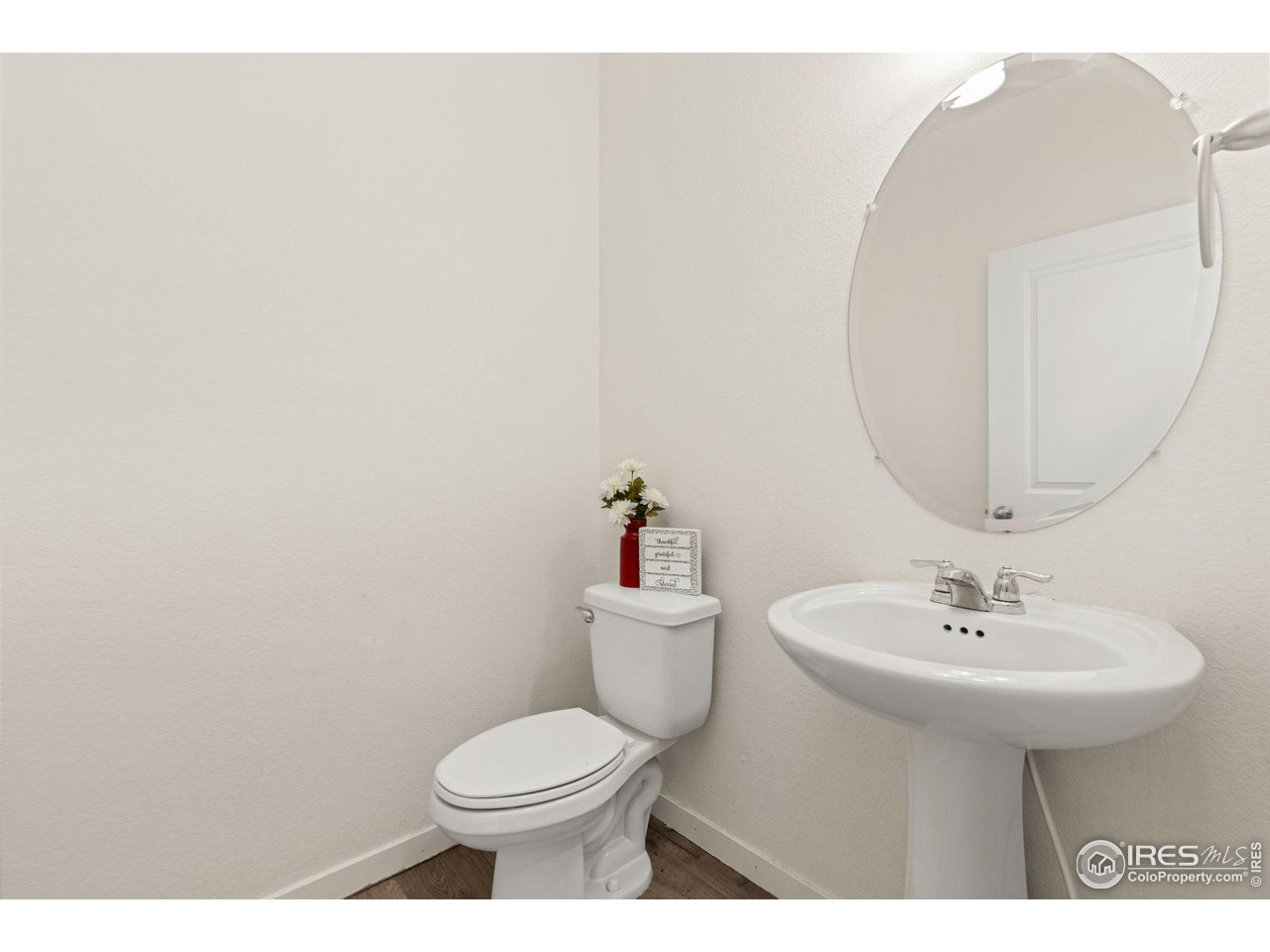 212 Swallow Road Johnstown, CO 80534 - Photo 17 of 32 Lower level powder room.