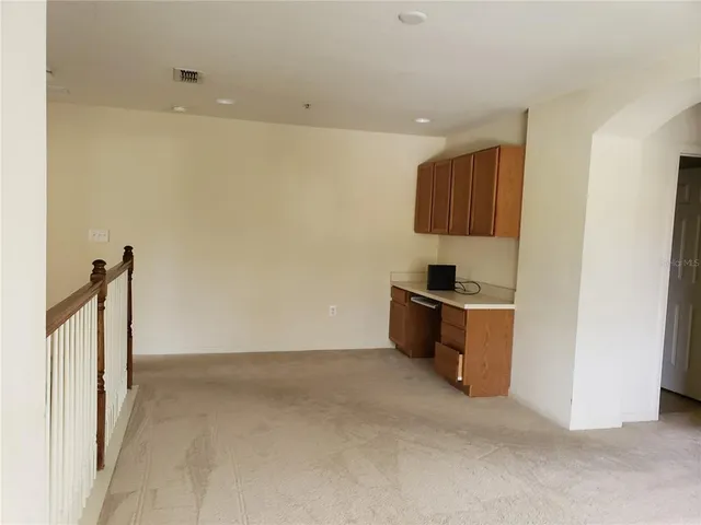 a room with a window and a table in it