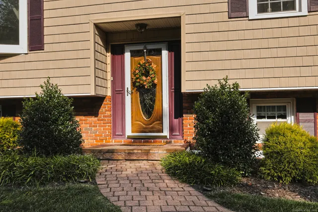 a view of a entryway door front of house