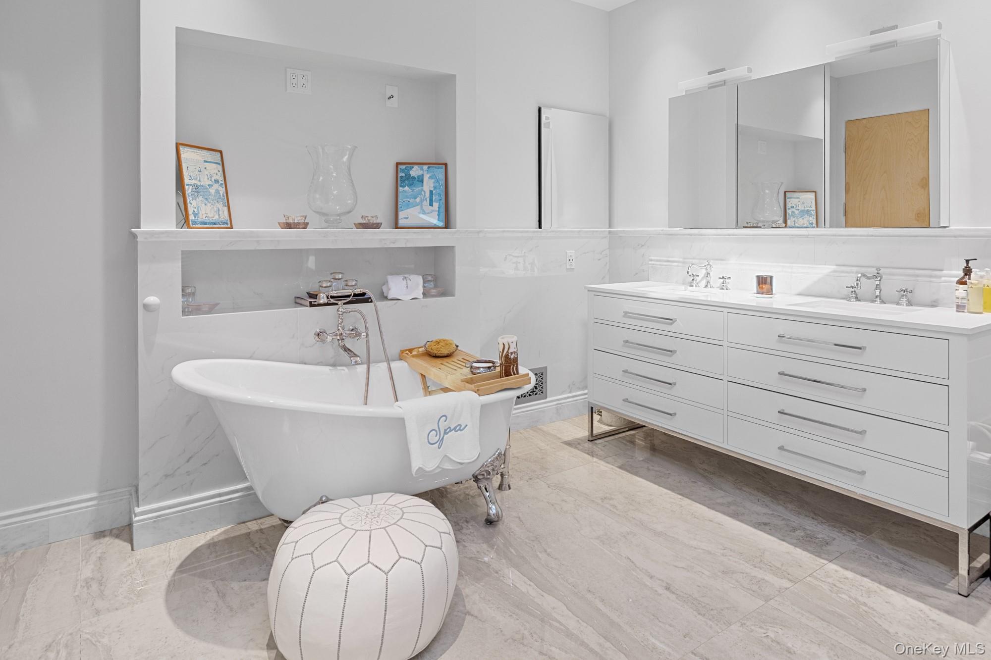 8 Mill Pond Lane Locust Valley, NY 11560 - Photo 15 of 38 a room with a baby crib and a dresser