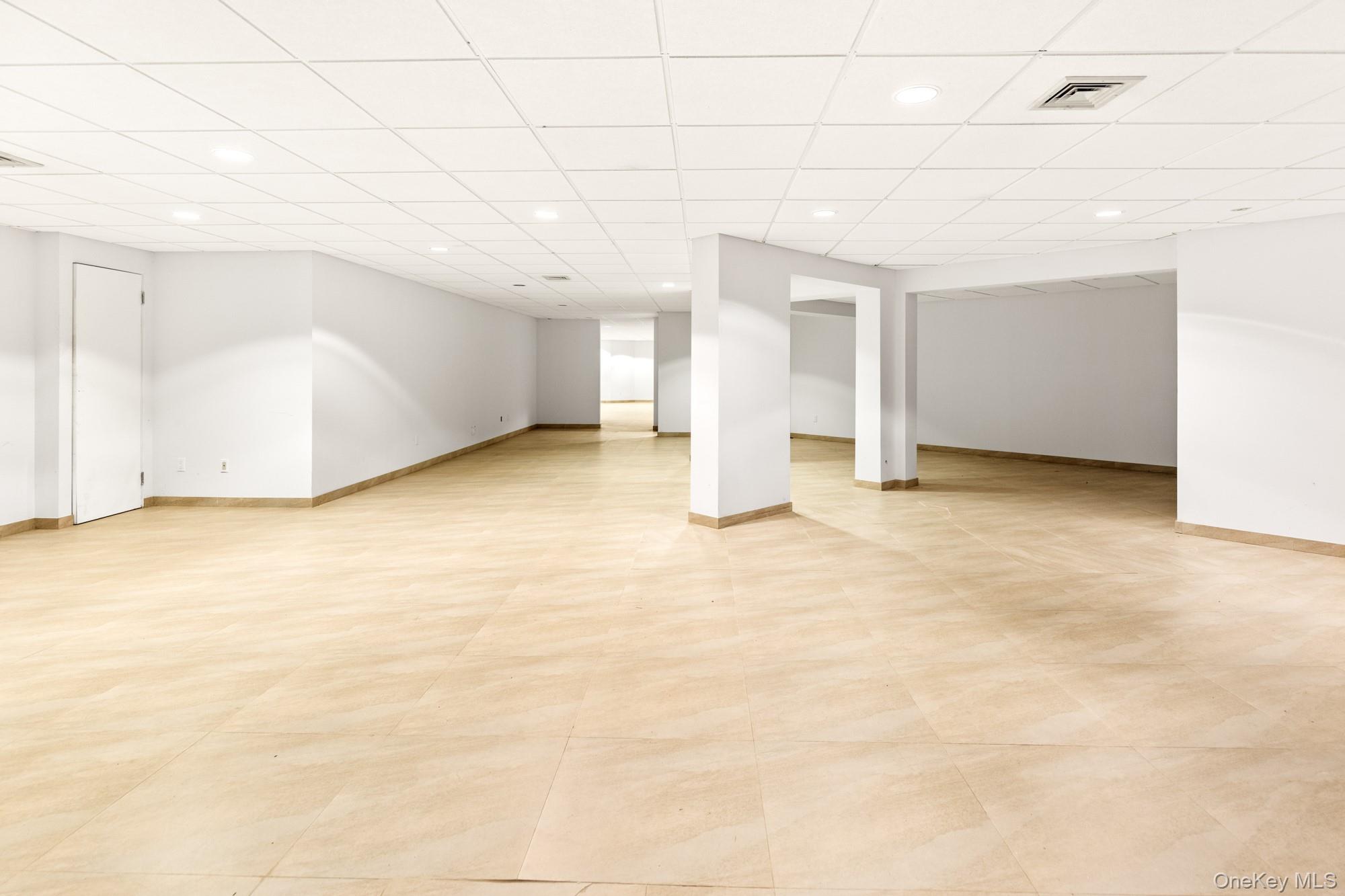 8 Mill Pond Lane Locust Valley, NY 11560 - Photo 26 of 38 a view of an empty room