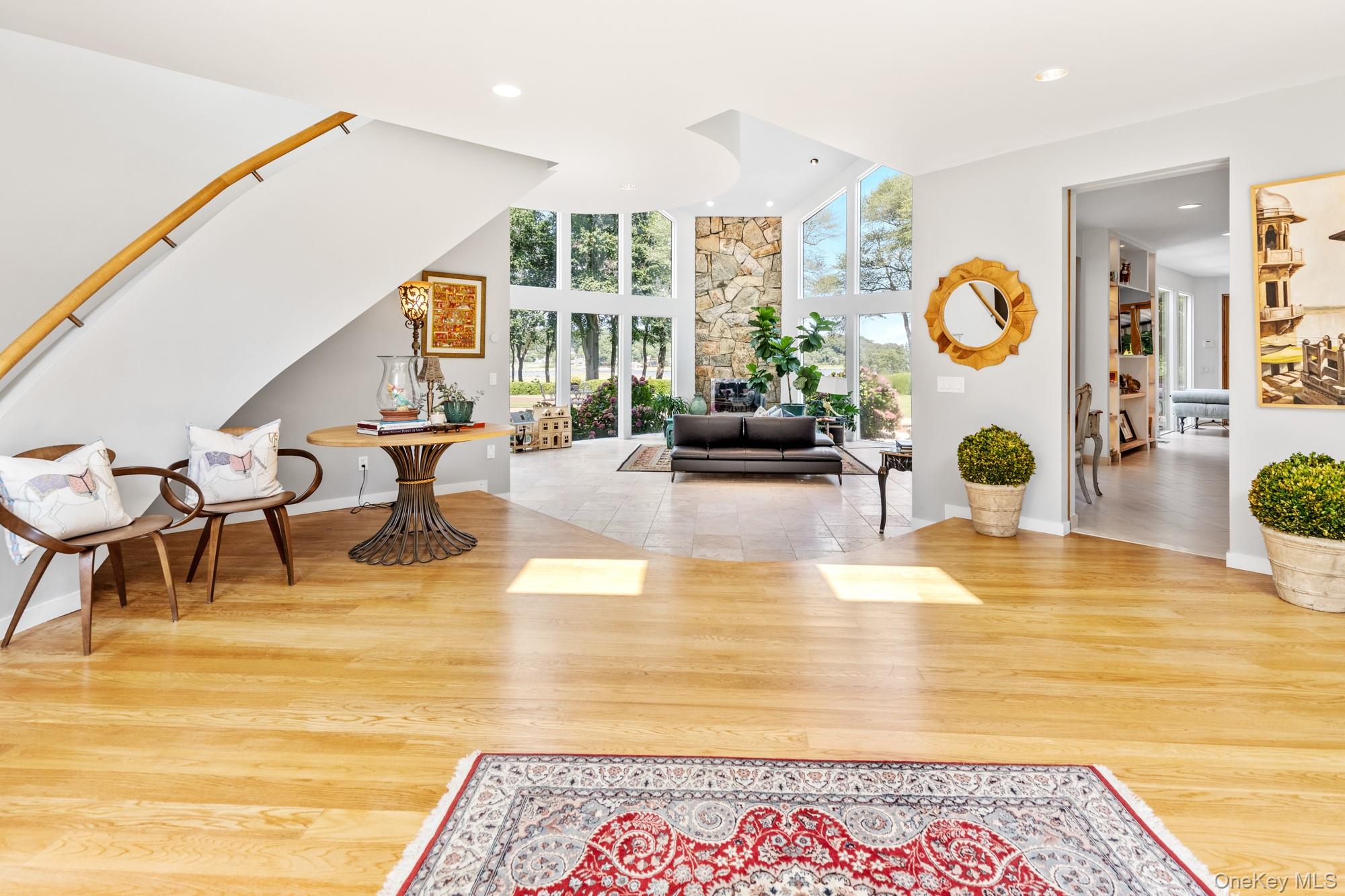 8 Mill Pond Lane Locust Valley, NY 11560 - Photo 5 of 38 a living room with furniture and a wooden floor