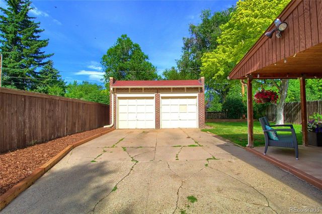 a view of backyard with green space