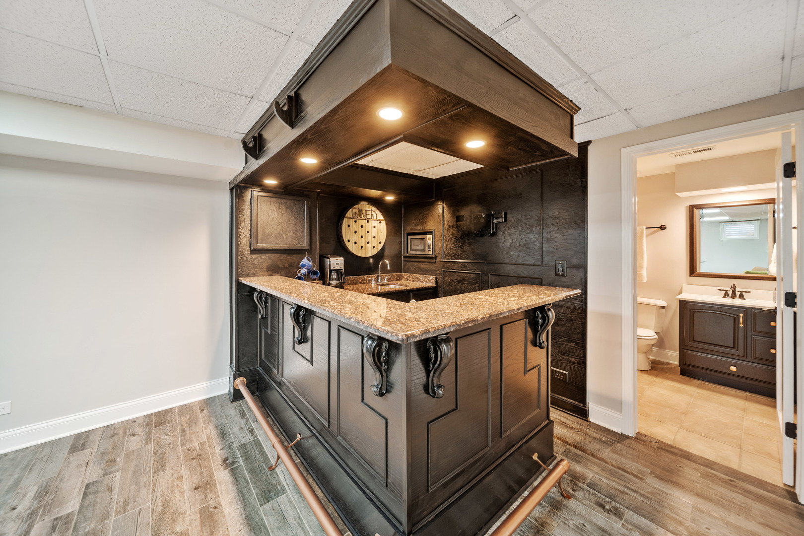 28W140 Mack Road Wheaton, IL 60189 - Photo 33 of 48 a view of kitchen with stove and wooden floor
