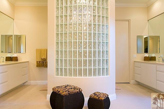 152 Loch Lomond Road Rancho Mirage, CA 92270 - Photo 14 of 26 a view of a bedroom with a window and bathroom