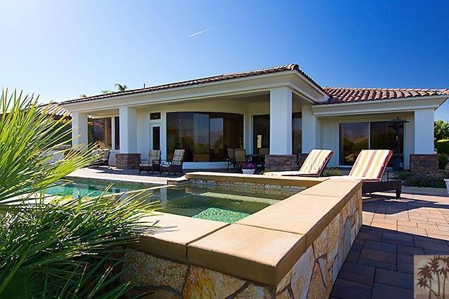 152 Loch Lomond Road Rancho Mirage, CA 92270 - Photo 19 of 26 a view of a house with swimming pool and sitting area
