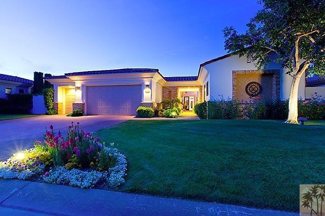 152 Loch Lomond Road Rancho Mirage, CA 92270 - Photo 2 of 26 a front view of a house with a yard