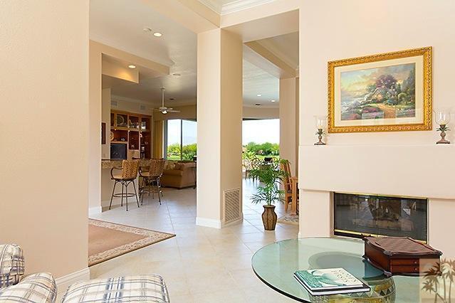 152 Loch Lomond Road Rancho Mirage, CA 92270 - Photo 6 of 26 a living room with furniture and a fireplace