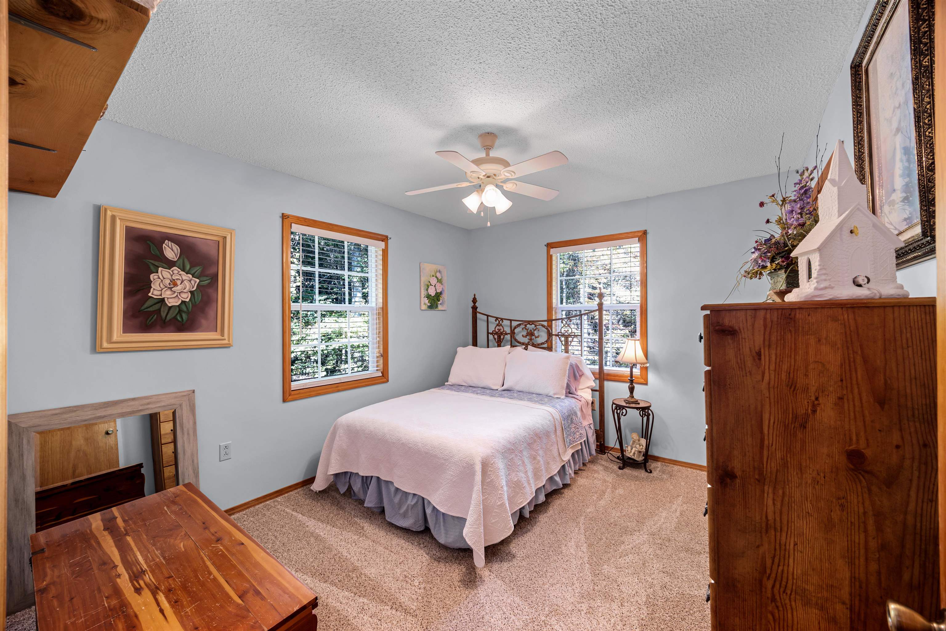61 Cr 303 Road Iuka, MS 38852 - Photo 17 of 19 Bedroom with ceiling fan, carpet, and a textured ceiling