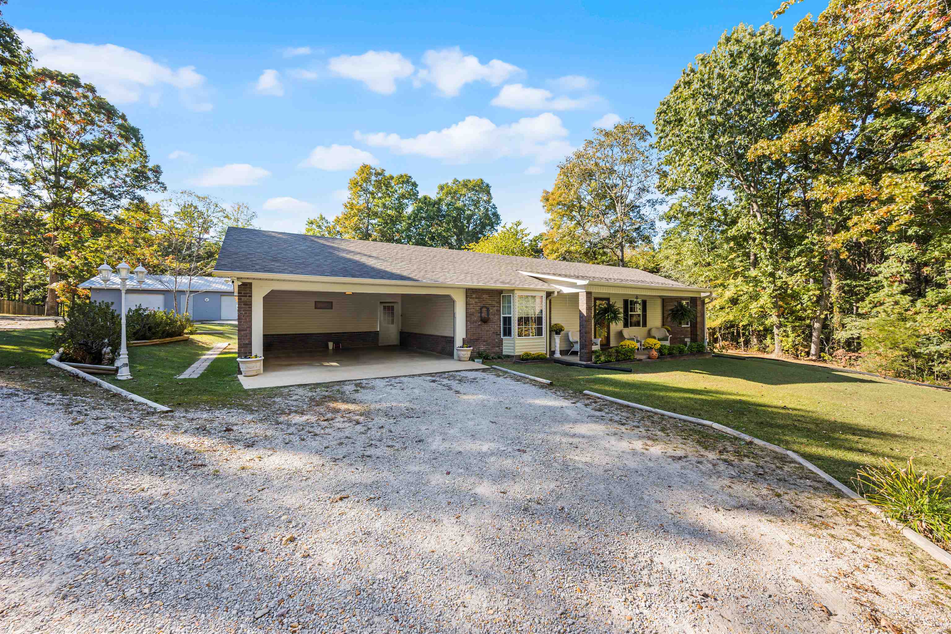 61 Cr 303 Road Iuka, MS 38852 - Photo 2 of 19 Single story home featuring a front lawn and a carport