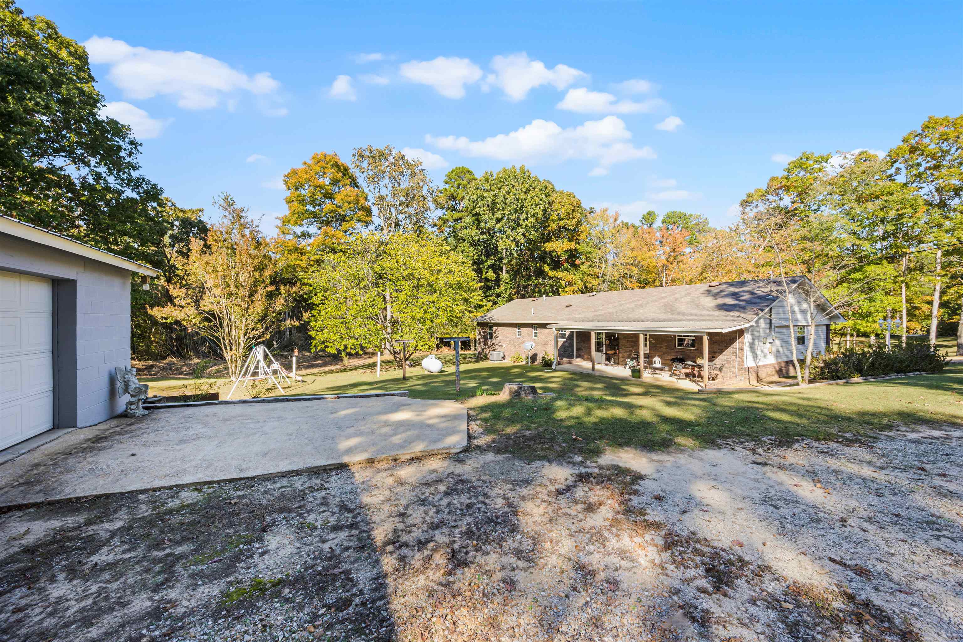 61 Cr 303 Road Iuka, MS 38852 - Photo 3 of 19 View of yard featuring a garage