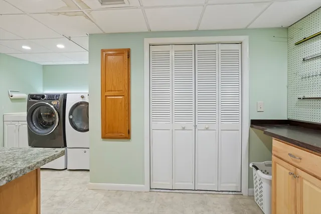 a view of walk in closet with window