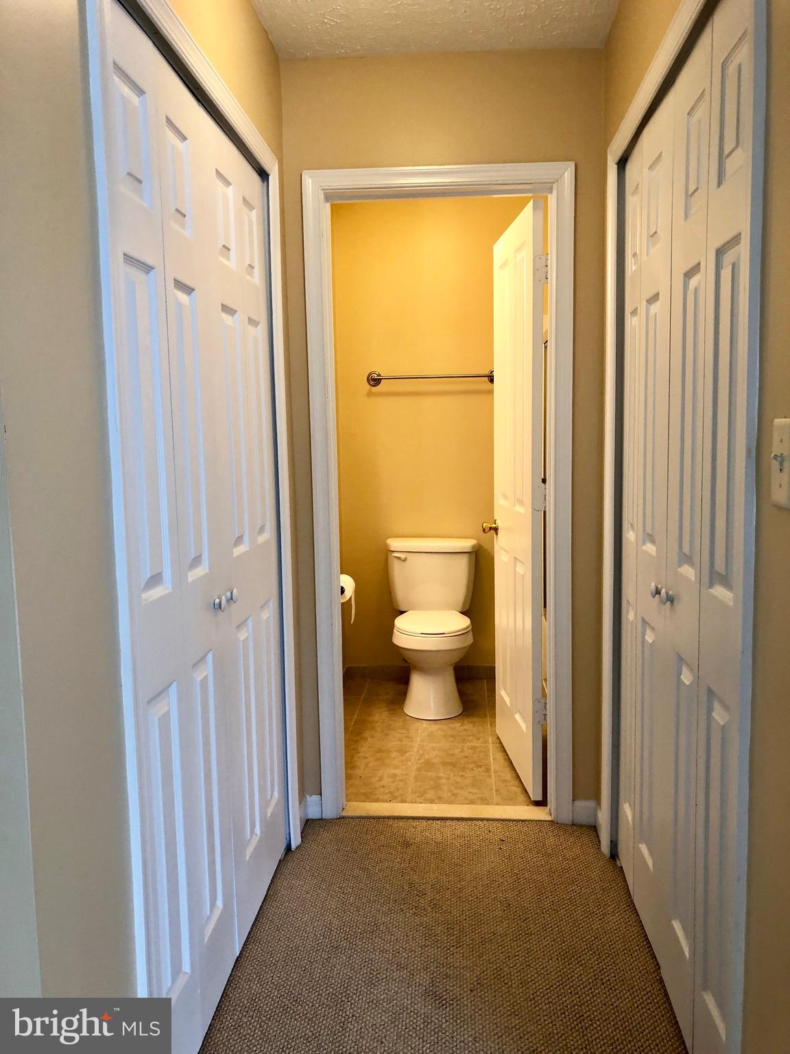 1803 Triple Feather Road, Unit 75 Severn, MD 21144 - Photo 11 of 15 His and Hers closets! 6 panel doors!!
