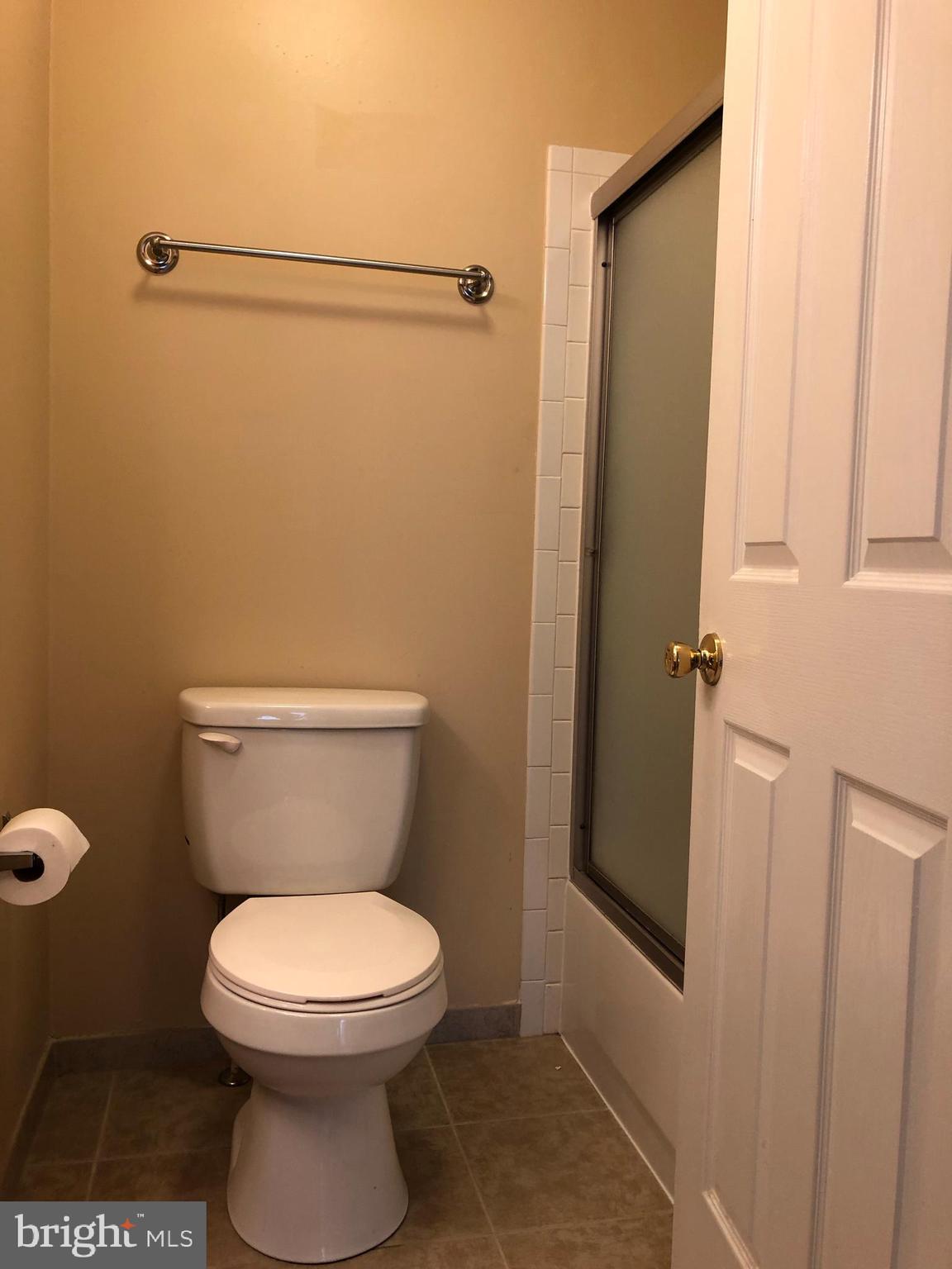 1803 Triple Feather Road, Unit 75 Severn, MD 21144 - Photo 12 of 15 Mater Bath with tile