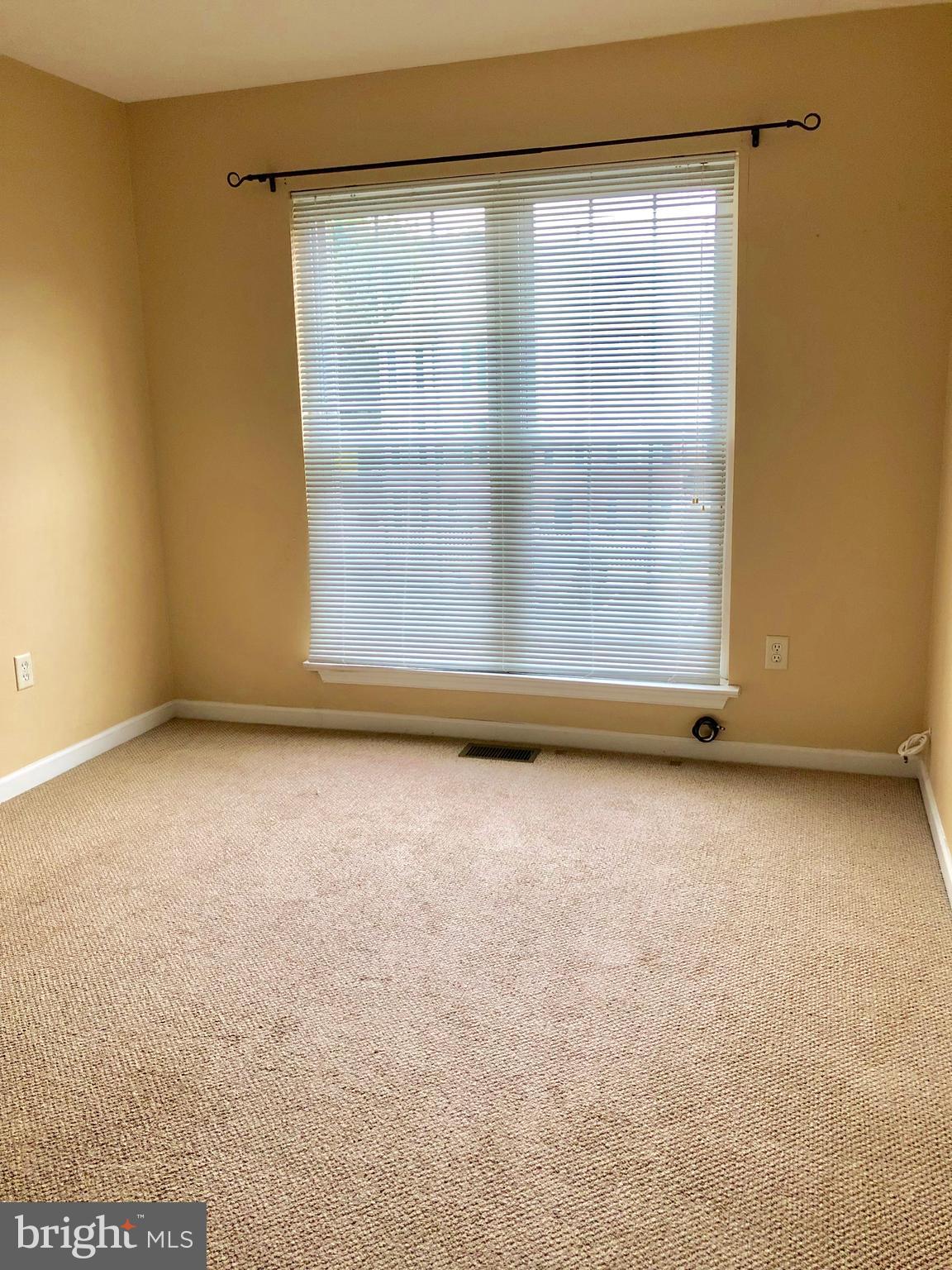 1803 Triple Feather Road, Unit 75 Severn, MD 21144 - Photo 13 of 15 Bright bedroom