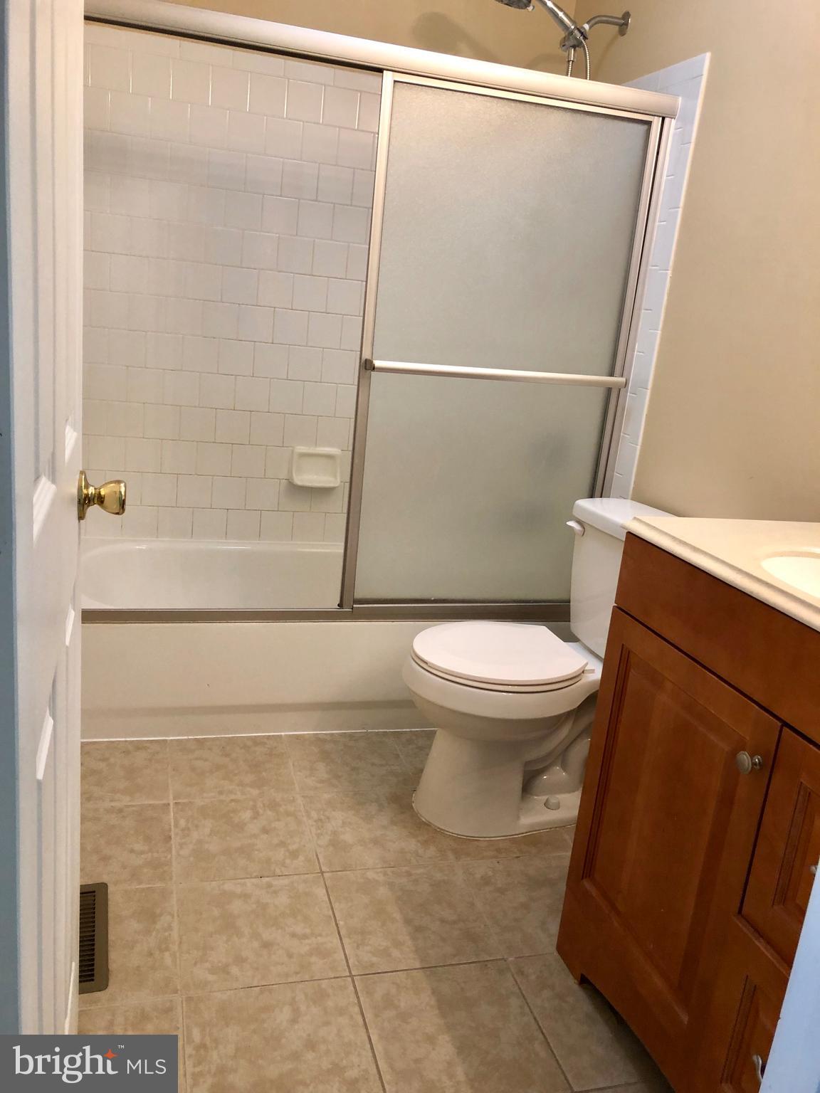 1803 Triple Feather Road, Unit 75 Severn, MD 21144 - Photo 14 of 15 2nd full bathroom with tile