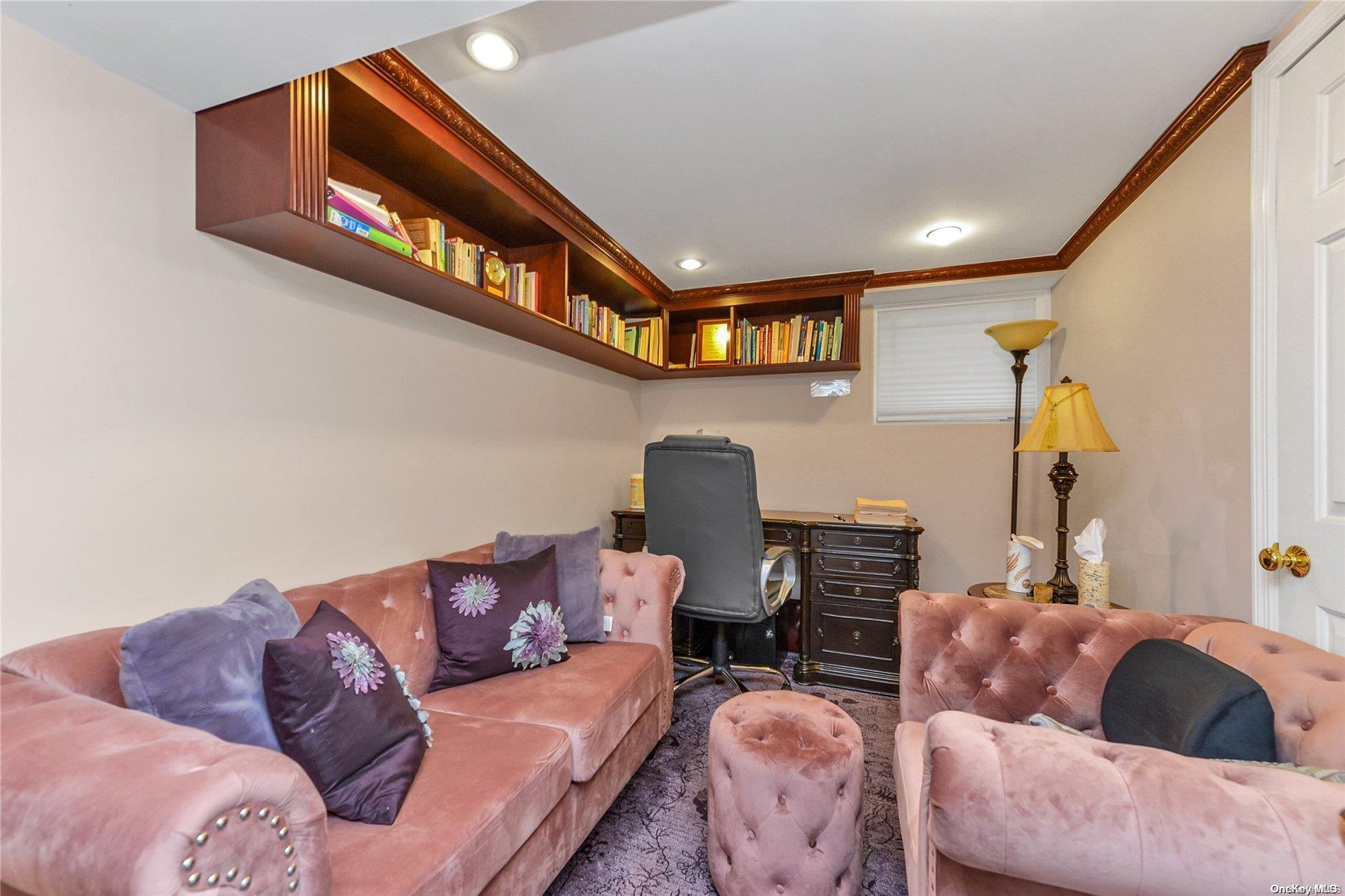 147-32 69th Road Queens, NY 11367 - Photo 20 of 24 a living room with furniture and a flat screen tv