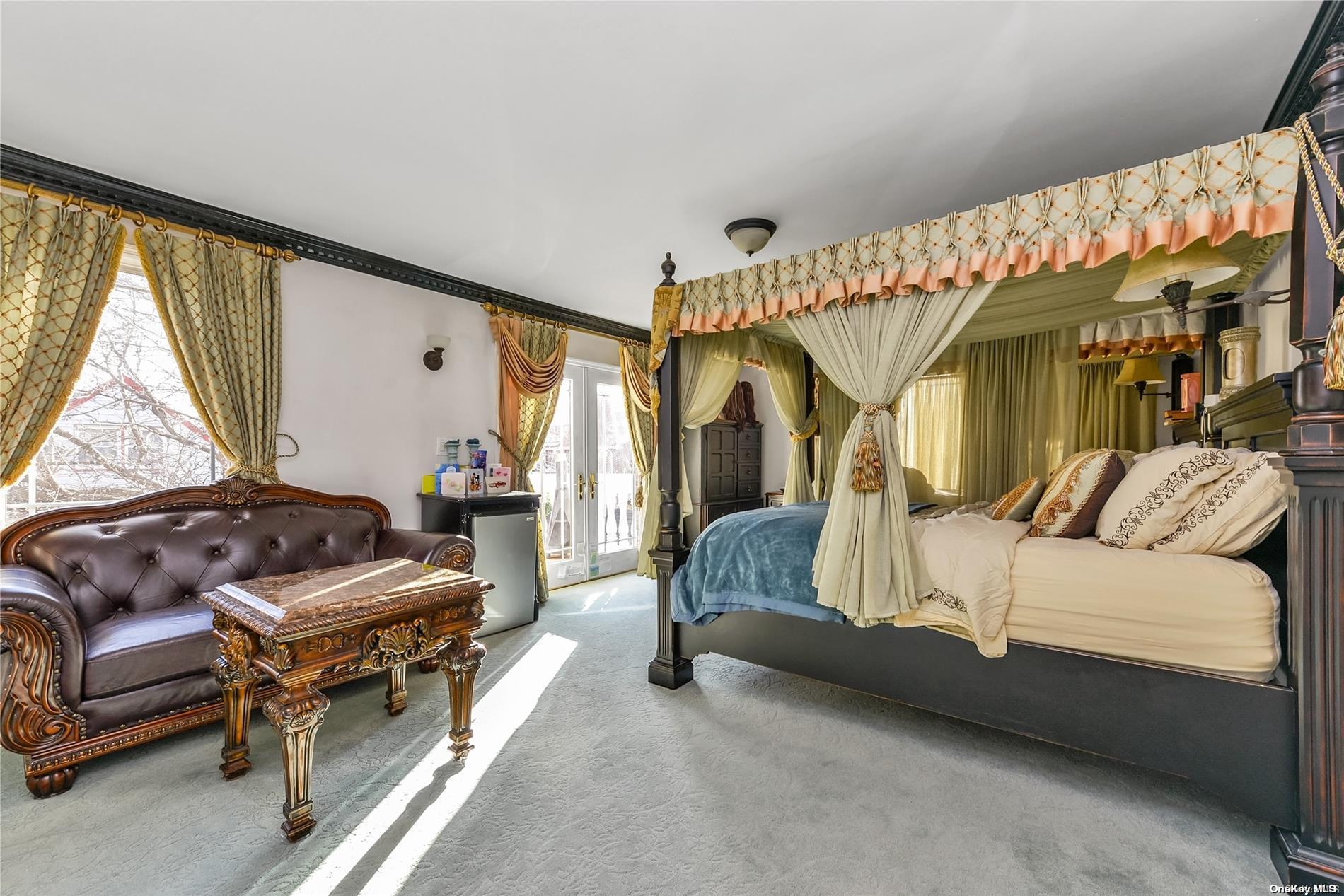 147-32 69th Road Queens, NY 11367 - Photo 9 of 24 a bedroom with furniture and a window