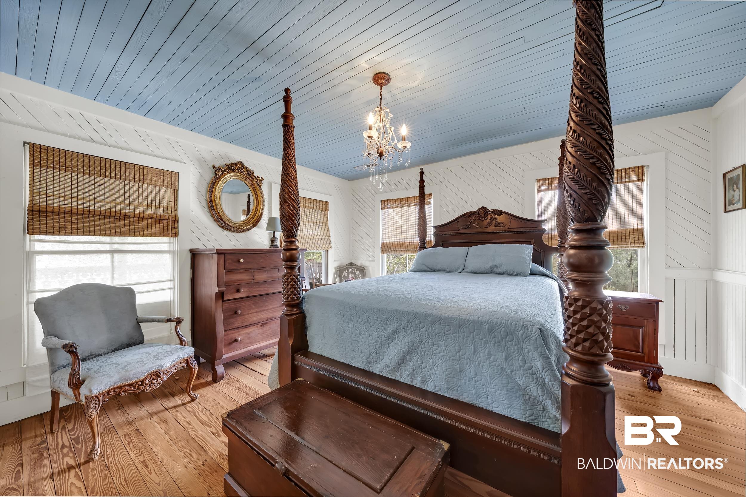 13232 Mary Ann Bch Road Fairhope, AL 36532 - Photo 38 of 79 Bedroom with light wood-type flooring, wood ceiling, and a chandelier