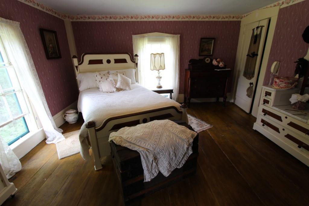 62 Roderick Road Newry, ME 04261 - Photo 28 of 35 Spacious bedroom with wide pine...