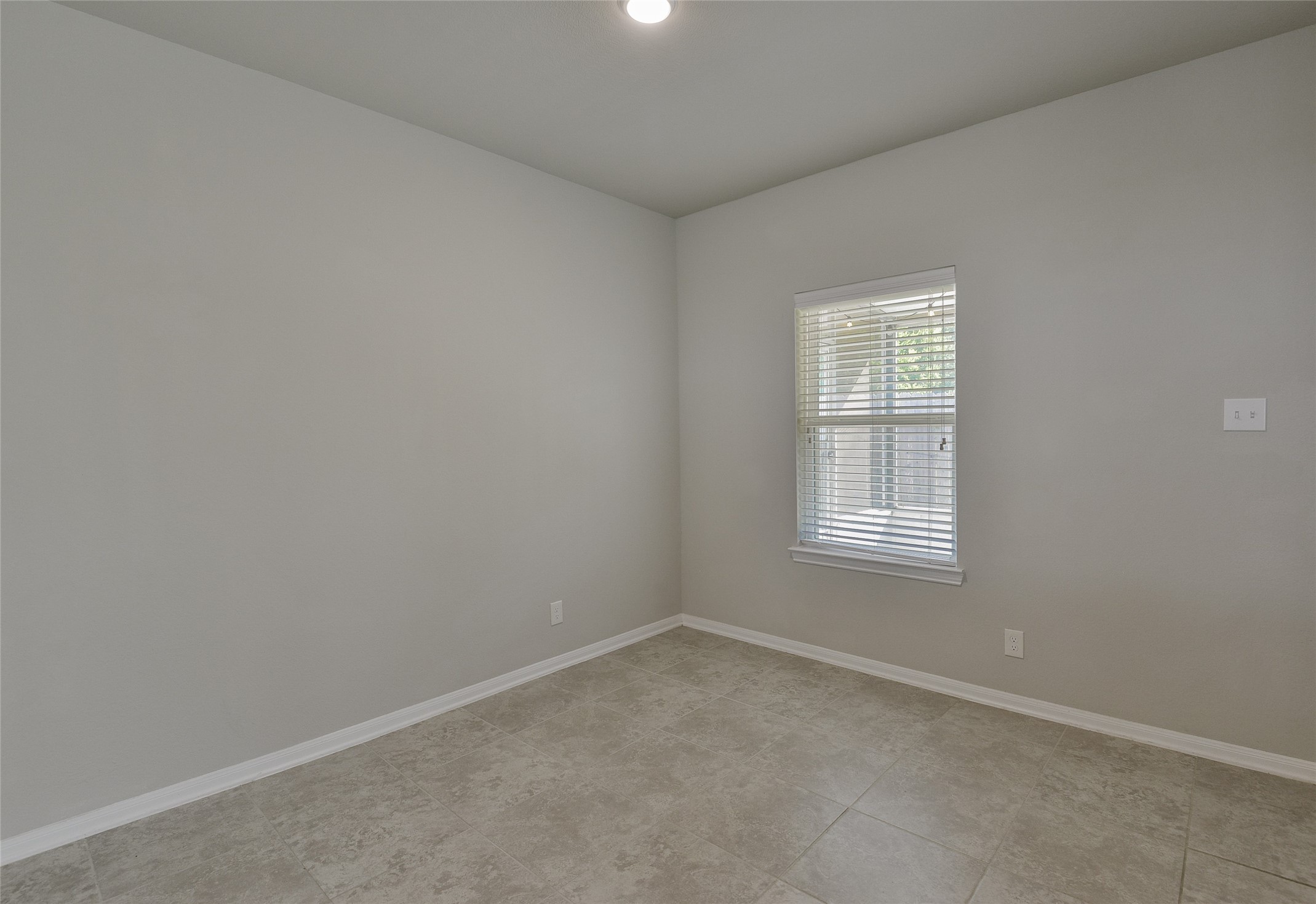 614 Pequin Road Crosby, TX 77532 - Photo 15 of 43 an empty room with a window
