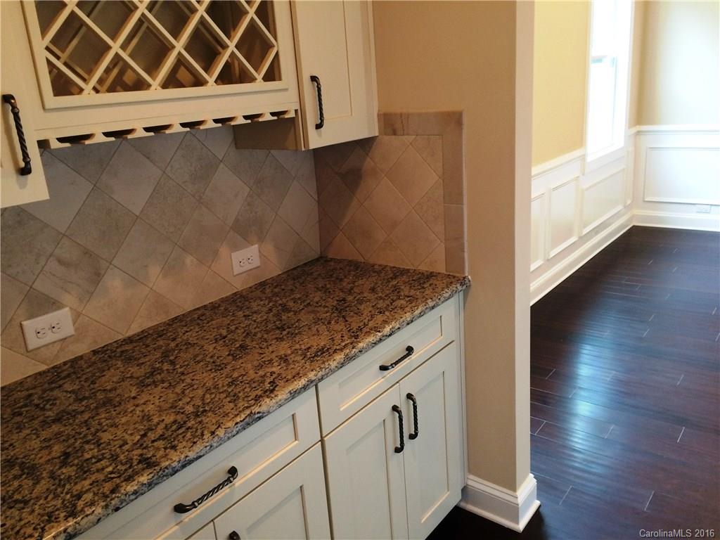 160 Kentmere Lane, Unit 81 Clover, SC 29710 - Photo 15 of 24 a view of a storage and utility room with wooden floor