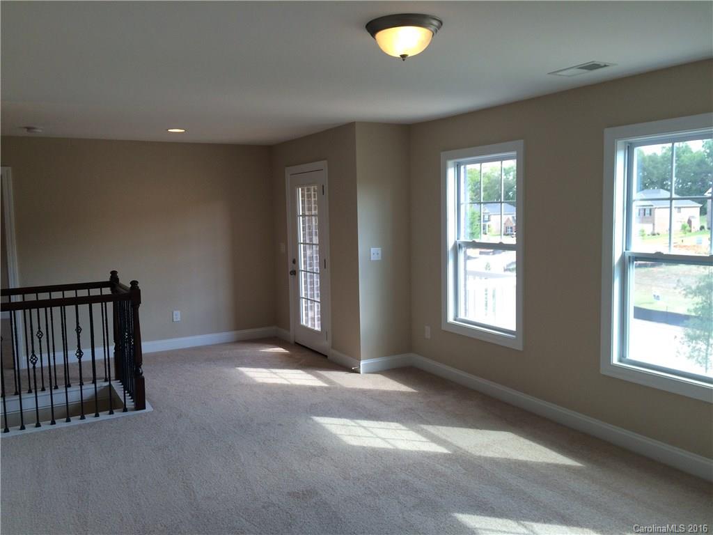 160 Kentmere Lane, Unit 81 Clover, SC 29710 - Photo 22 of 24 a view of an empty room with a window