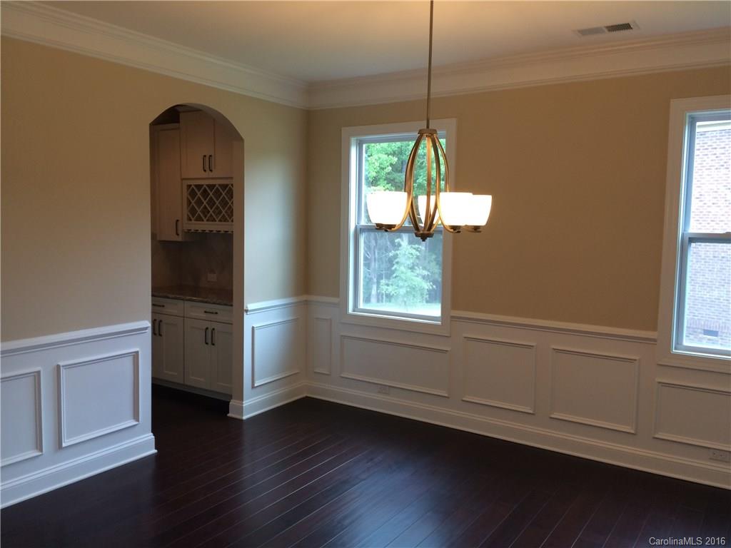 160 Kentmere Lane, Unit 81 Clover, SC 29710 - Photo 6 of 24 a view of an empty room with a window and wooden floor