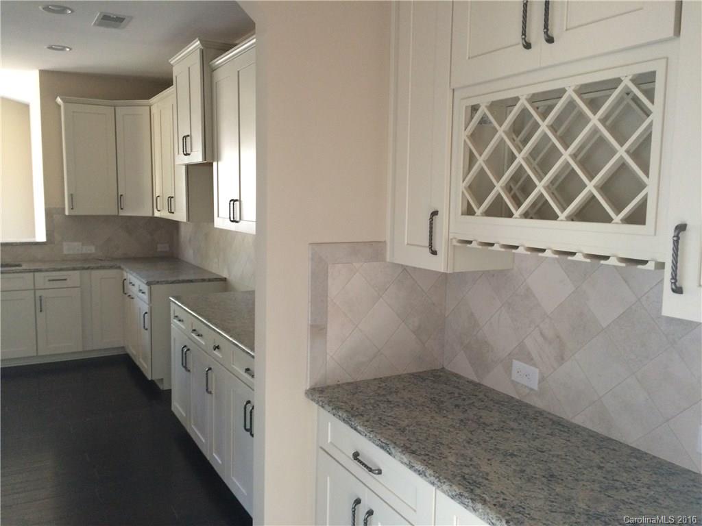 160 Kentmere Lane, Unit 81 Clover, SC 29710 - Photo 8 of 24 a kitchen with a sink cabinets and window