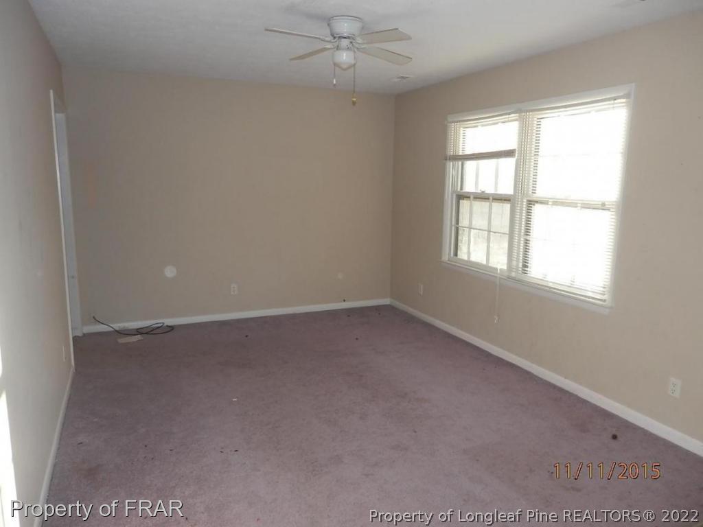 5910 Spinner Road Hope Mills, NC 28348 - Photo 12 of 12 an empty room with a window