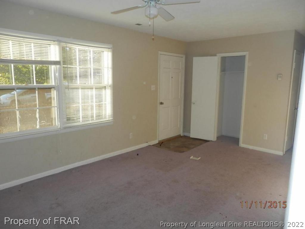 5910 Spinner Road Hope Mills, NC 28348 - Photo 7 of 12 an empty room with a window