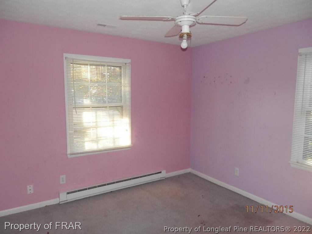 5910 Spinner Road Hope Mills, NC 28348 - Photo 10 of 12 an empty room with a window