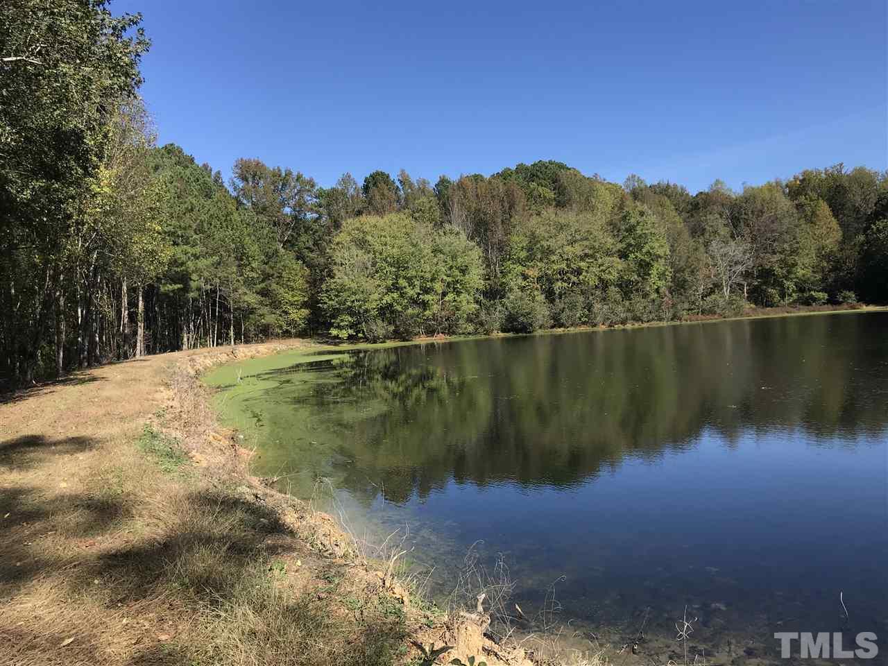 1921 Eddie Howard Road Willow Spring, NC 27592 - Photo 1 of 2 a view of lake
