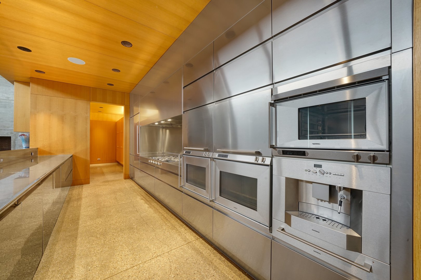7320 Saratoga Road Morris, IL 60450 - Photo 15 of 61 a view of a kitchen with a stove and a microwave
