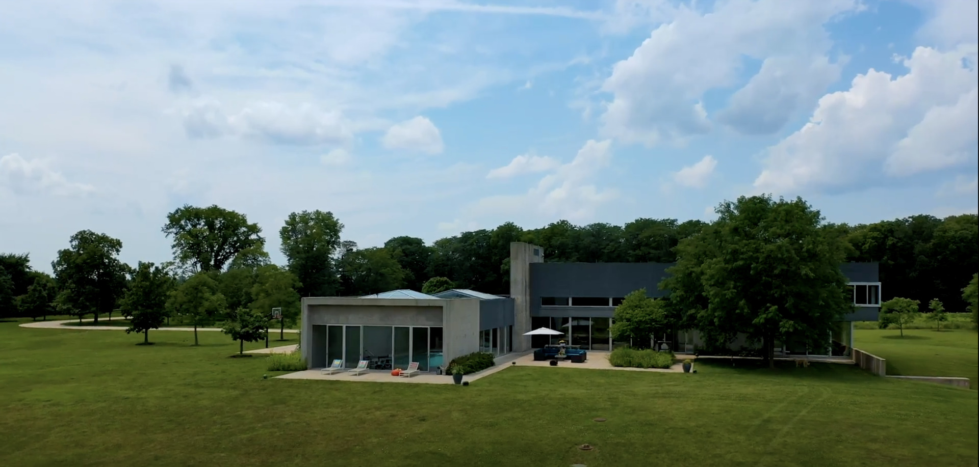 7320 Saratoga Road Morris, IL 60450 - Photo 4 of 61 a view of a house with a big yard potted plants and large trees