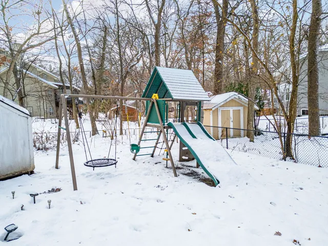 a backyard of a house with seating space