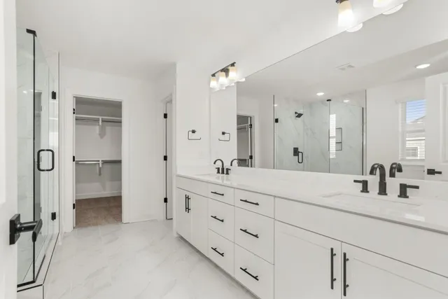 a bathroom with a shower and a bathtub