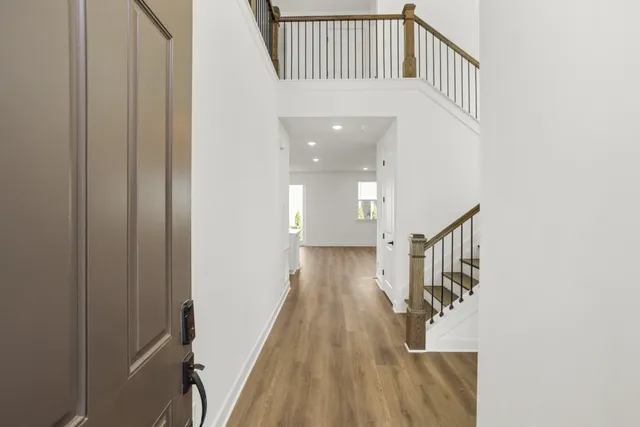 a view of entryway with wooden floor