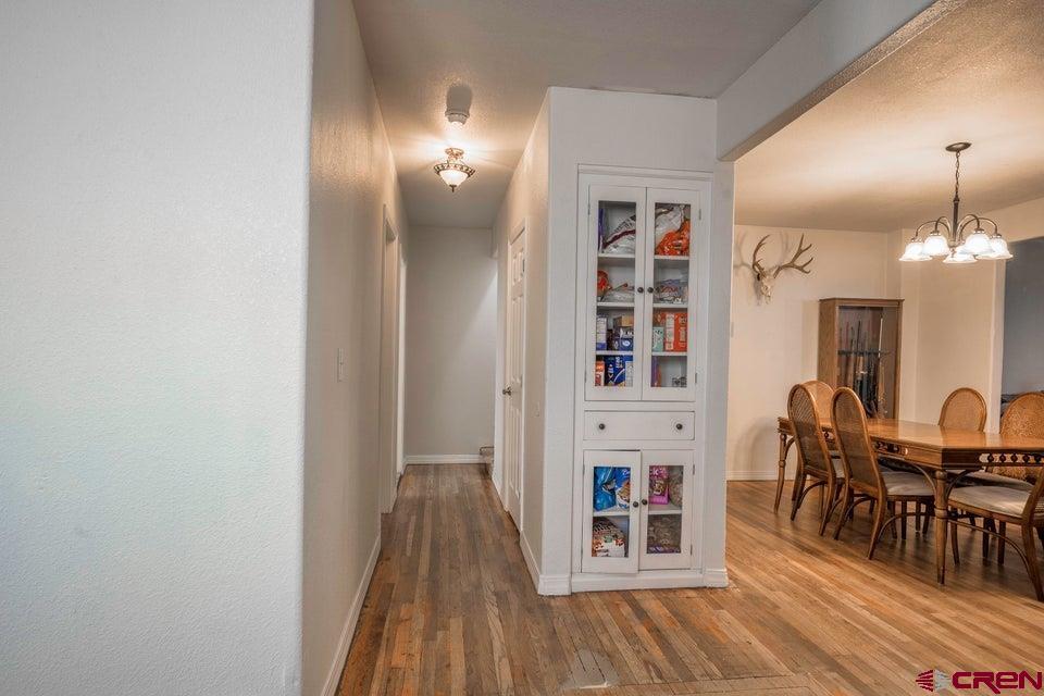 522 East First Street, Unit A & B Trinidad, CO 81082 - Photo 14 of 45 a view of a livingroom with furniture and wooden floor