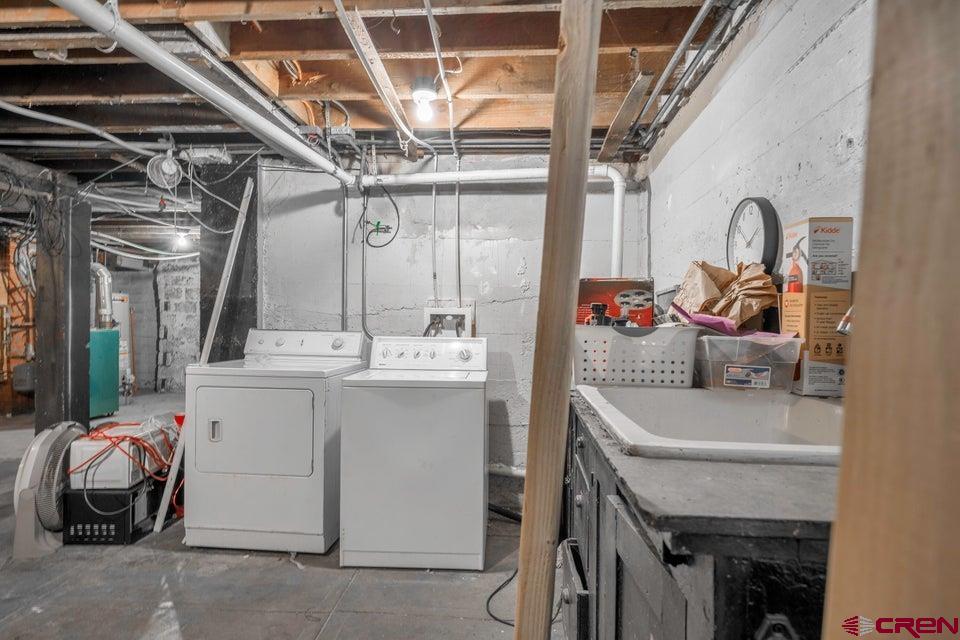 522 East First Street, Unit A & B Trinidad, CO 81082 - Photo 22 of 45 a utility room with a sink dryer and washer
