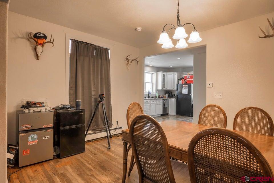 522 East First Street, Unit A & B Trinidad, CO 81082 - Photo 8 of 45 a kitchen with a refrigerator and a stove