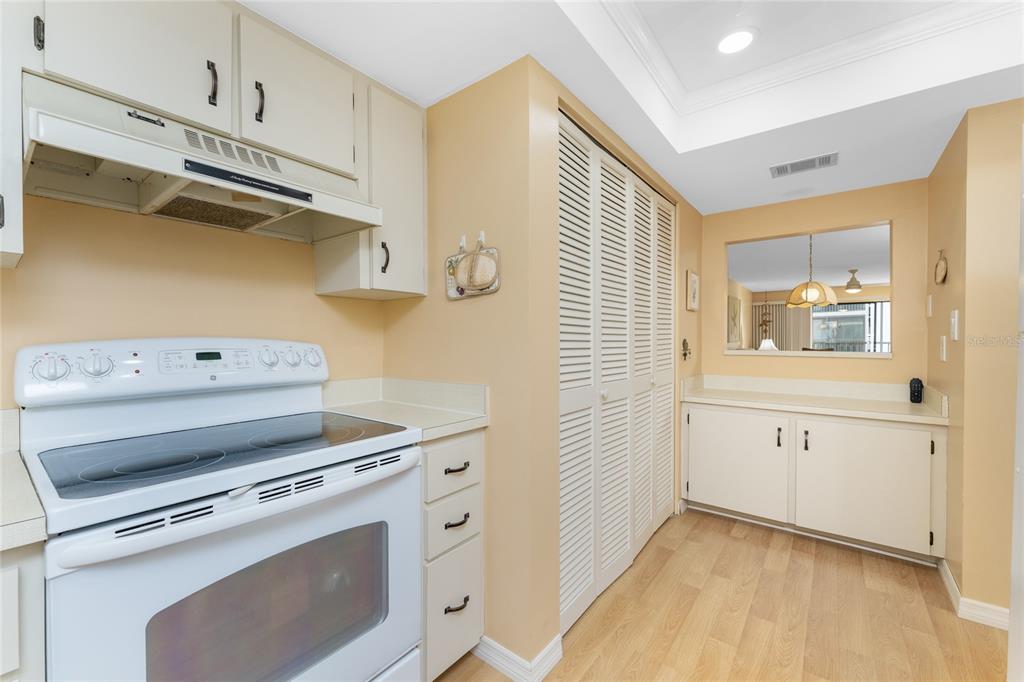 2700 North Beach Road, Unit E107 Englewood, FL 34223 - Photo 17 of 62 a view of a kitchen with storage and utility