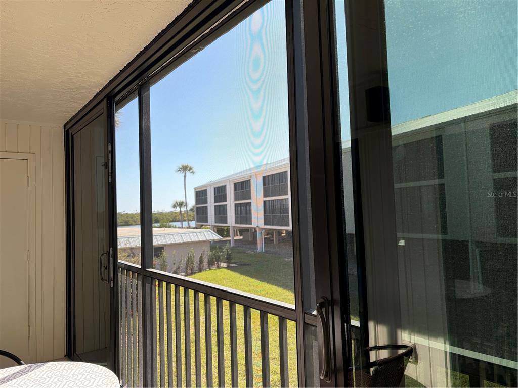 2700 North Beach Road, Unit E107 Englewood, FL 34223 - Photo 36 of 62 a view of a balcony