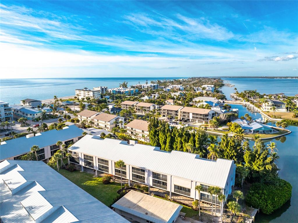 2700 North Beach Road, Unit E107 Englewood, FL 34223 - Photo 48 of 62 an aerial view of multiple house