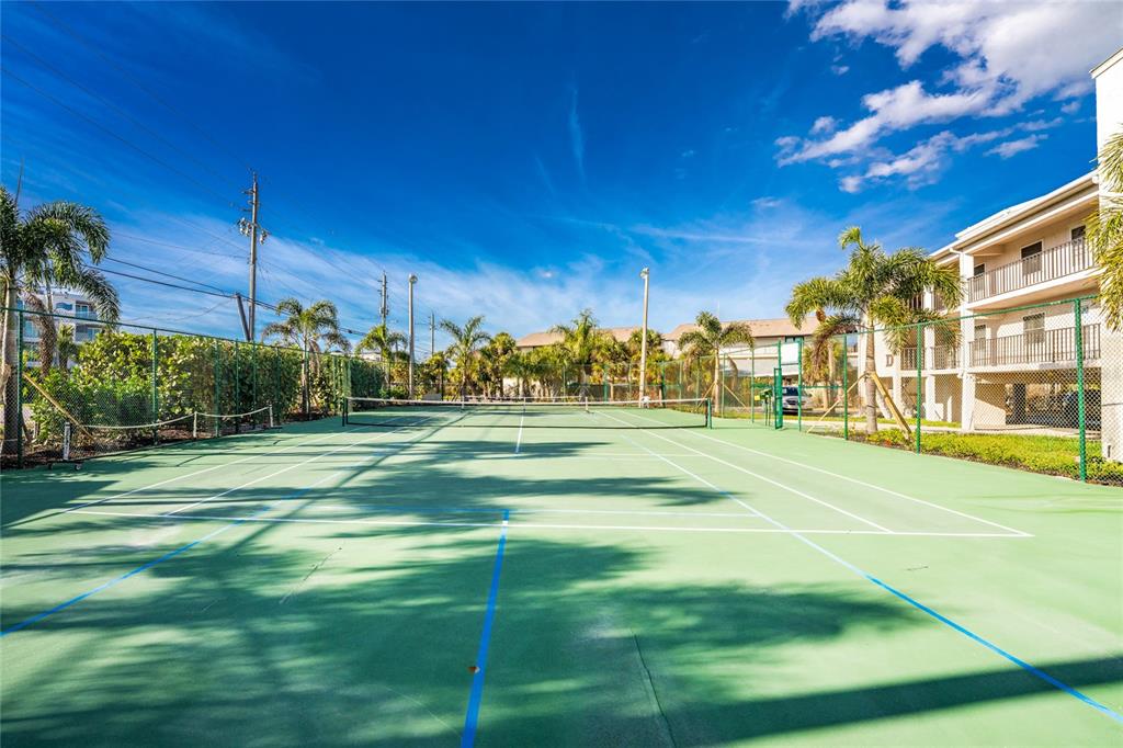 2700 North Beach Road, Unit E107 Englewood, FL 34223 - Photo 58 of 62 a view of a volley ball court